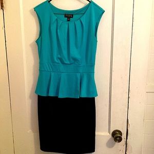 This is a dress a wore only a couple of times to weddings. Maker Enfocus Studio